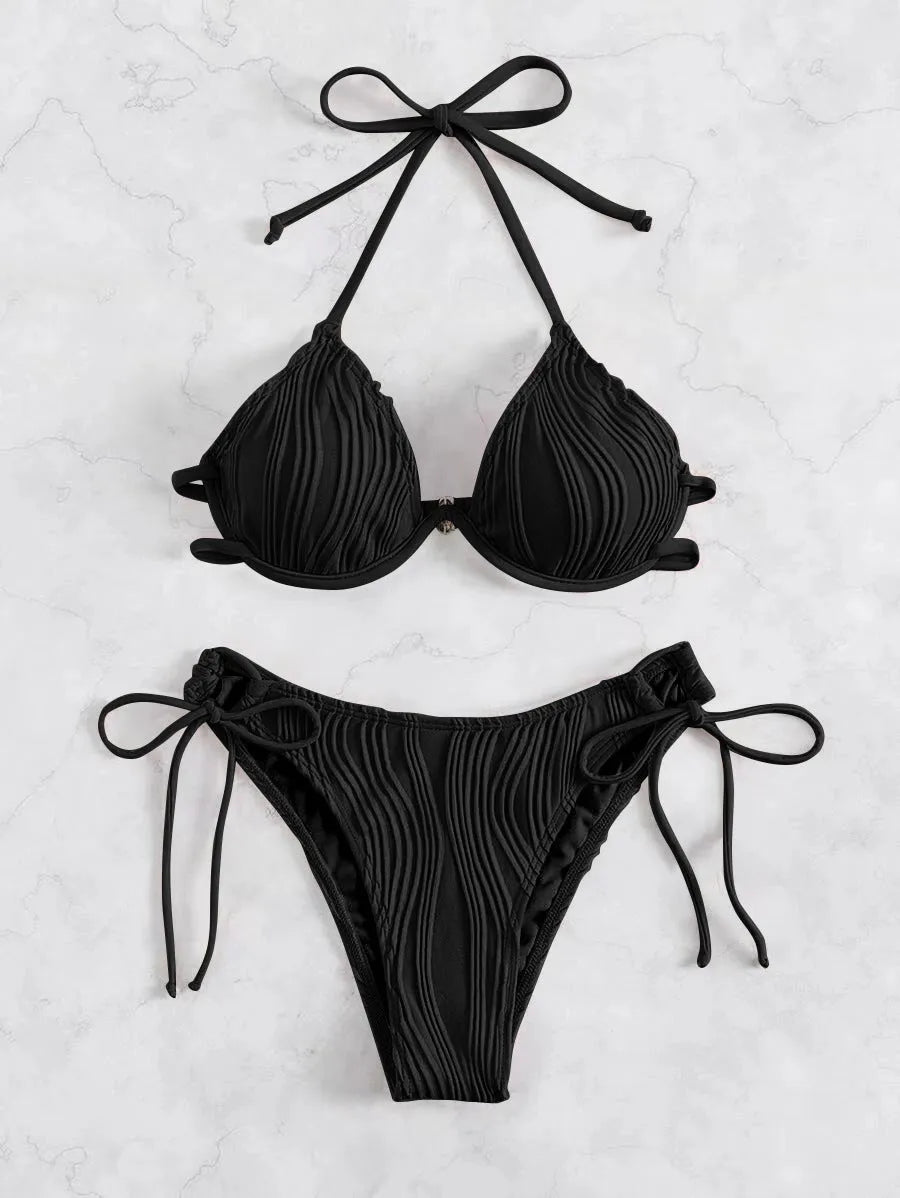 Women's apricot coloured bikini set with underwire cups and adjustable ties.