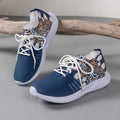 Women's woven flat casual sneakers in green with mesh upper, round toe, front lace-up, and rubber sole