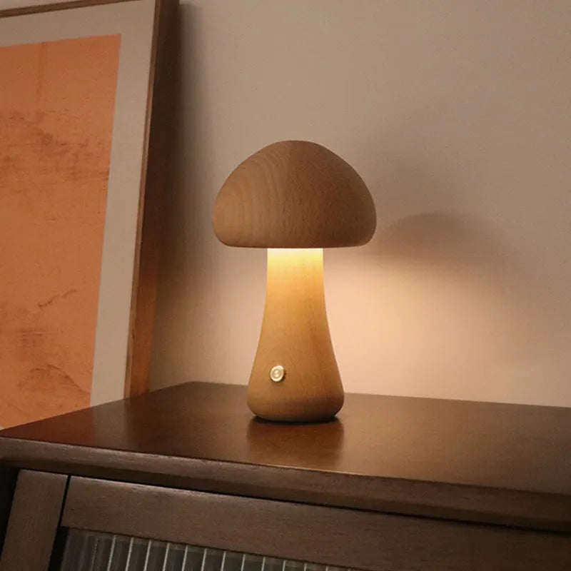 Wooden mushroom-shaped LED night light with touch switch on a bedside table, beech finish, 165 x 100 mm