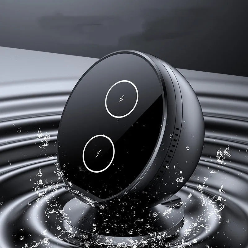 Black multifunctional Bluetooth speaker with integrated wireless phone charging pad on top.