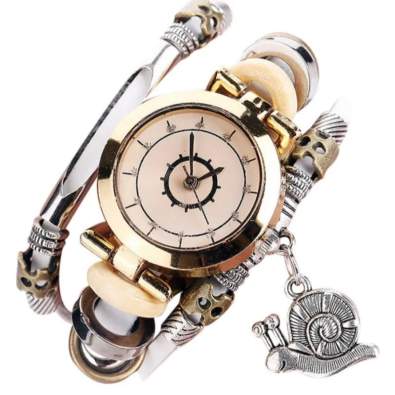 Women's vintage bracelet watch with coiling leather strap and snail pendant in Mori style