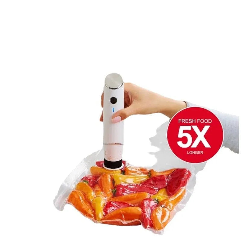 White USB electric vacuum sealer pump with five 26x28cm plastic food storage bags.