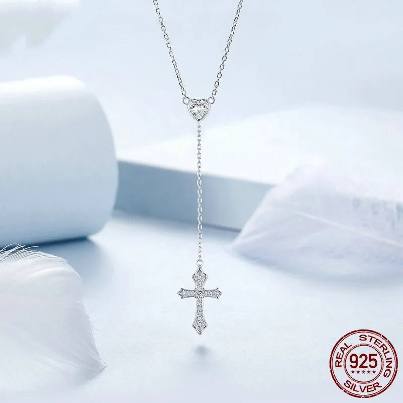 Women's sterling silver V-neck cross necklace on an O-ring chain in BSN384 colour.