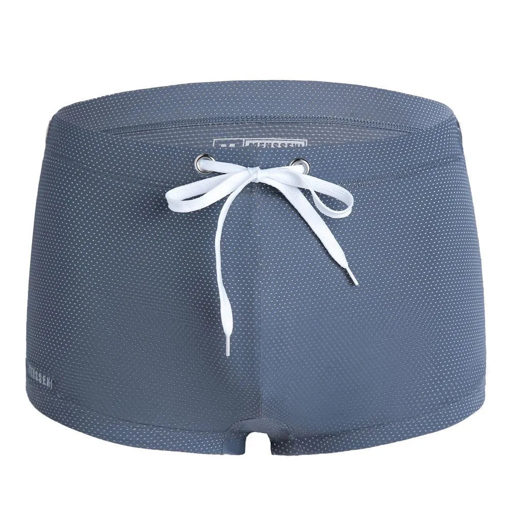 Men's low waist lace nylon boxer swimming trunks in multiple colours on a white background
