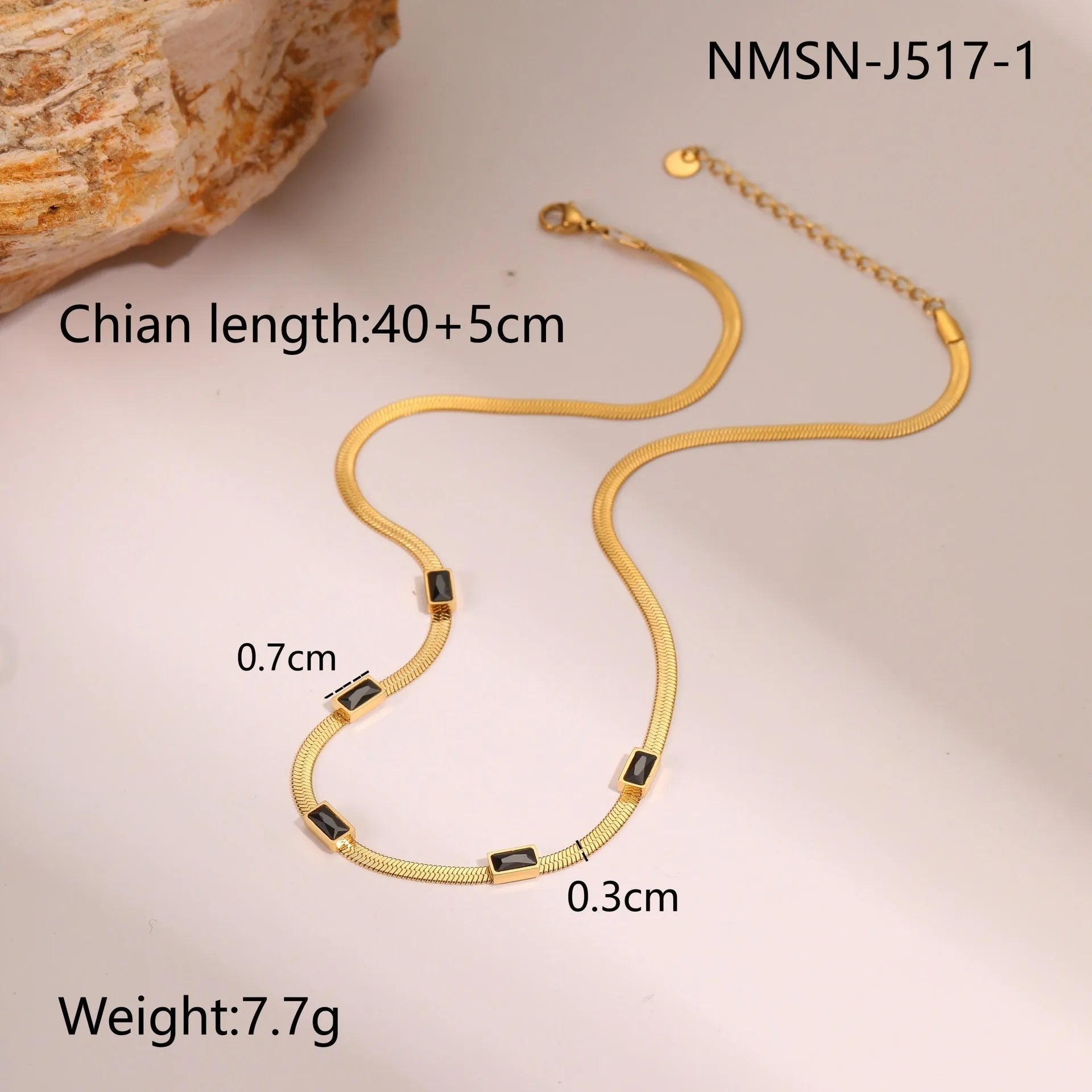 Geometric square zircon pendant on a flat stainless steel snake chain necklace in gold or steel colour.