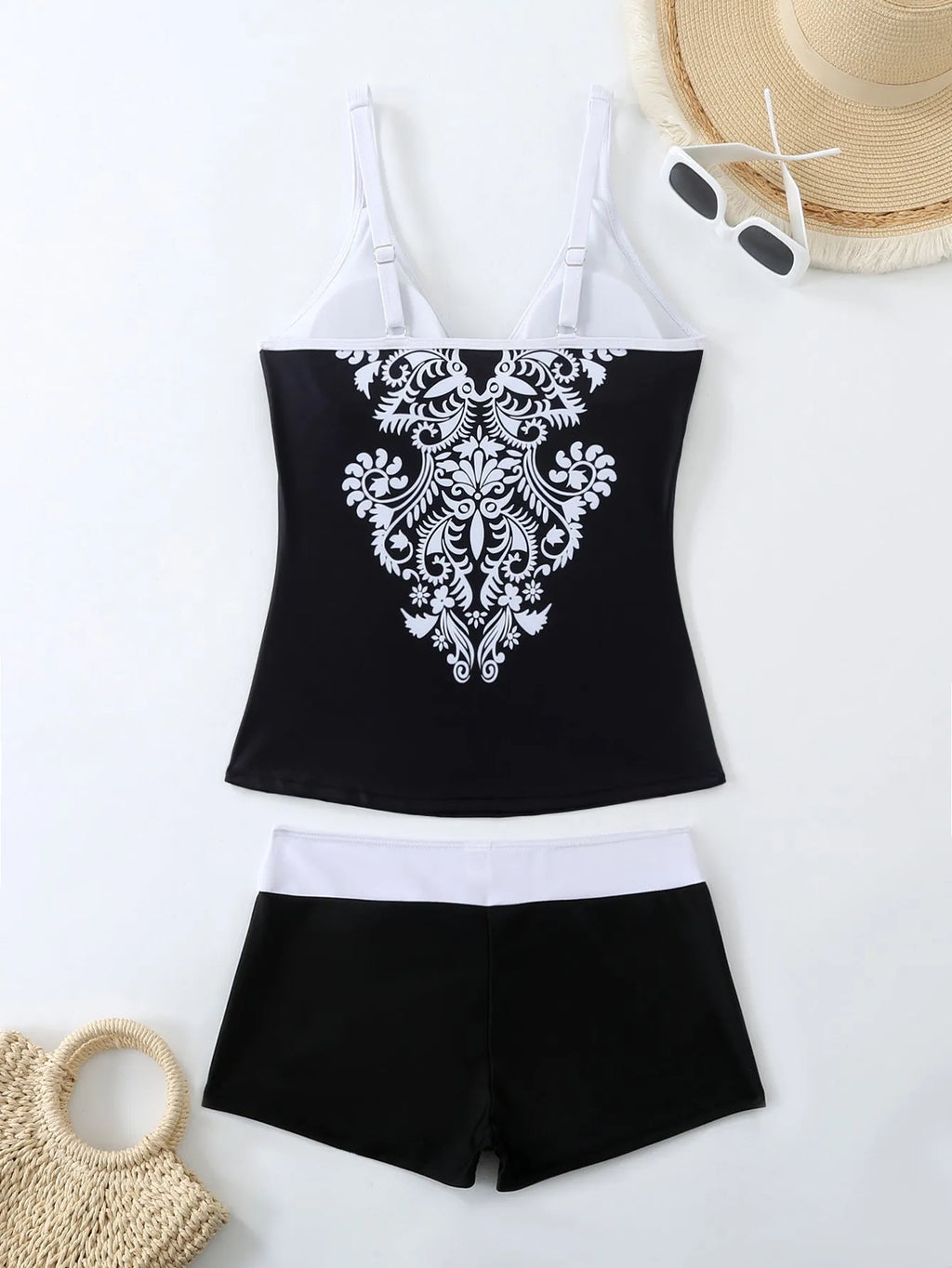 Plus size women's printed two-piece swimsuit in black or rose red with briefs style.