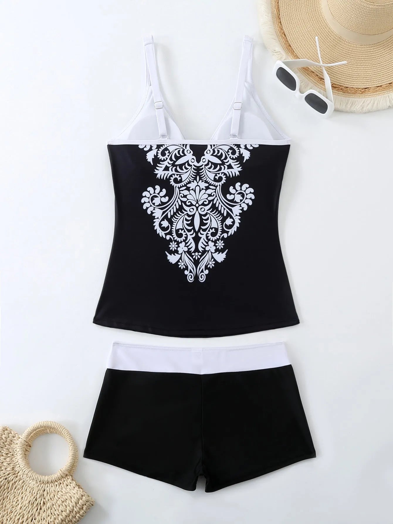 Plus size women's printed two-piece swimsuit in black or rose red with briefs style.
