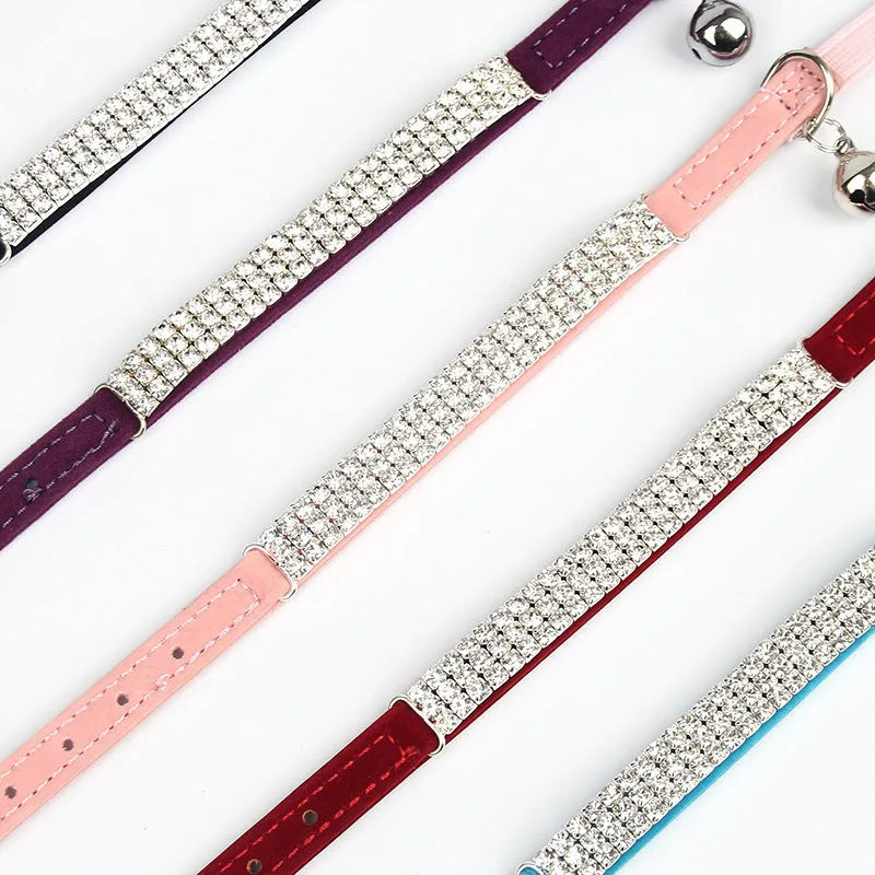 Red velvet suede cat collar with rhinestones, showing adjustable buckle and 1cm width.