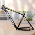 Black green aluminium mountain bike frame showing disc brake mount and inner cable routing ports