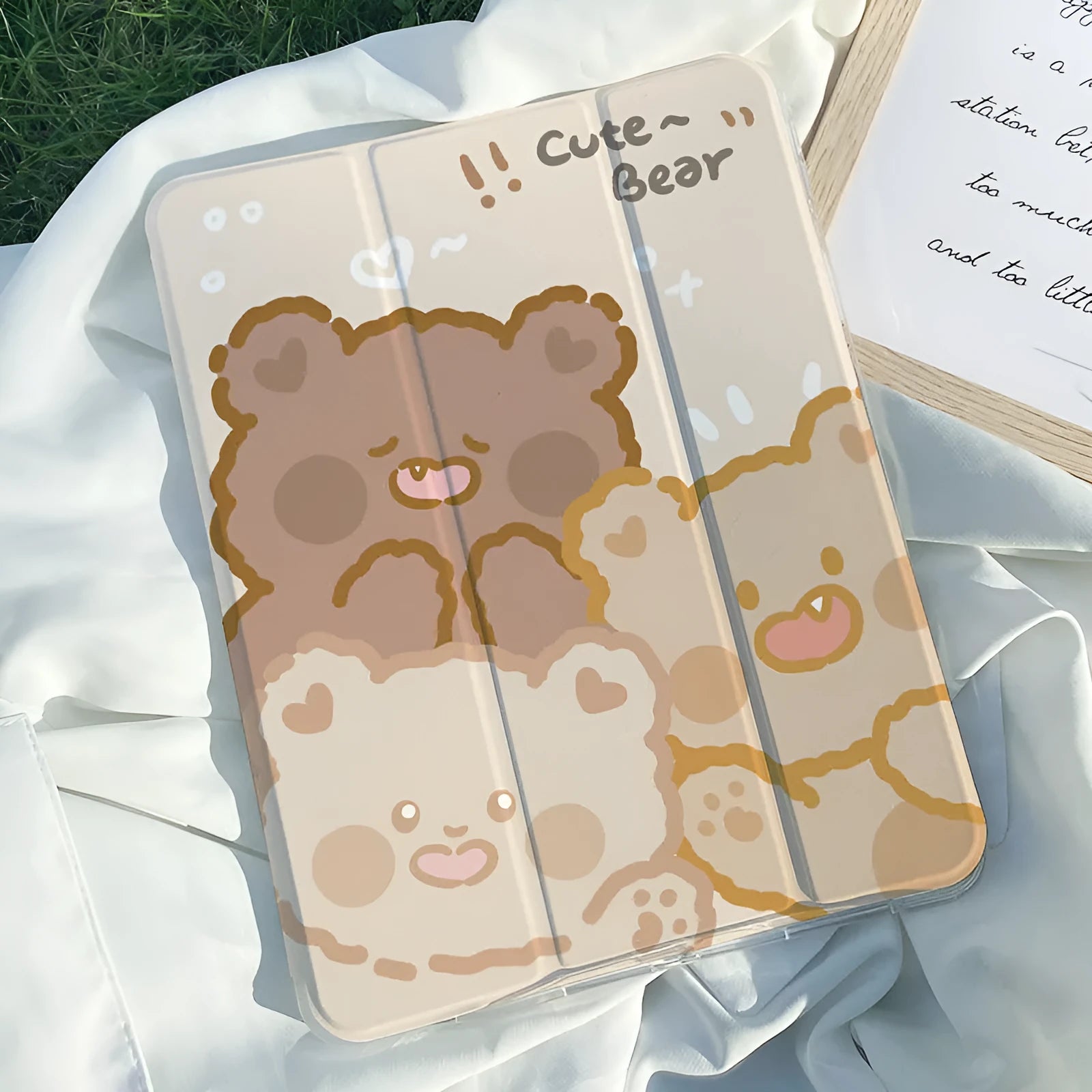 Silicone tri-fold iPad protective case showing rabbit pattern and stand position.