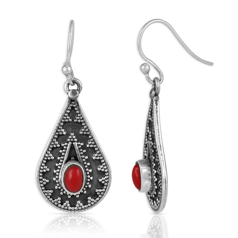 Silver drop-shaped retro earrings for women with European and American national style design.