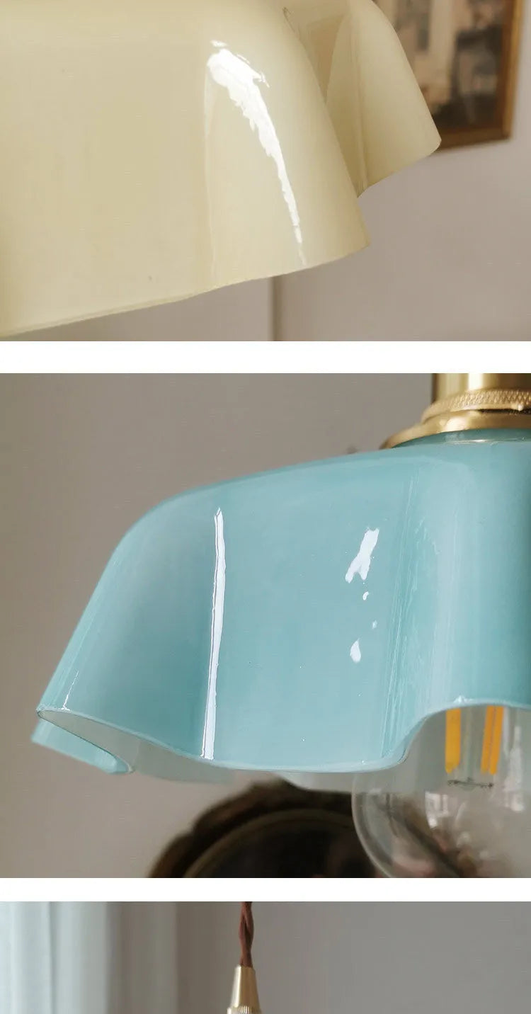 Medieval brass French chandelier light with glass shade, shown with adjustable cable.