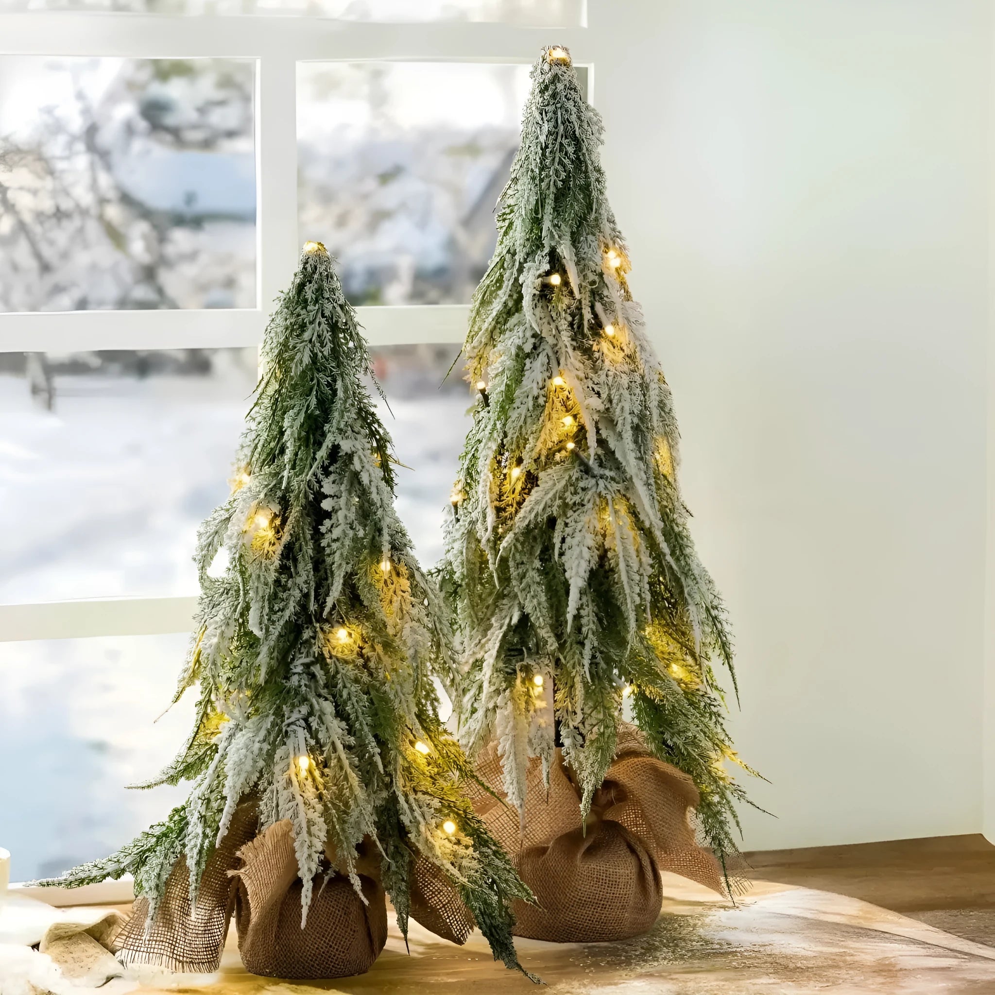 24-inch green artificial Christmas tree with integrated lights and PE snow sprayer decoration
