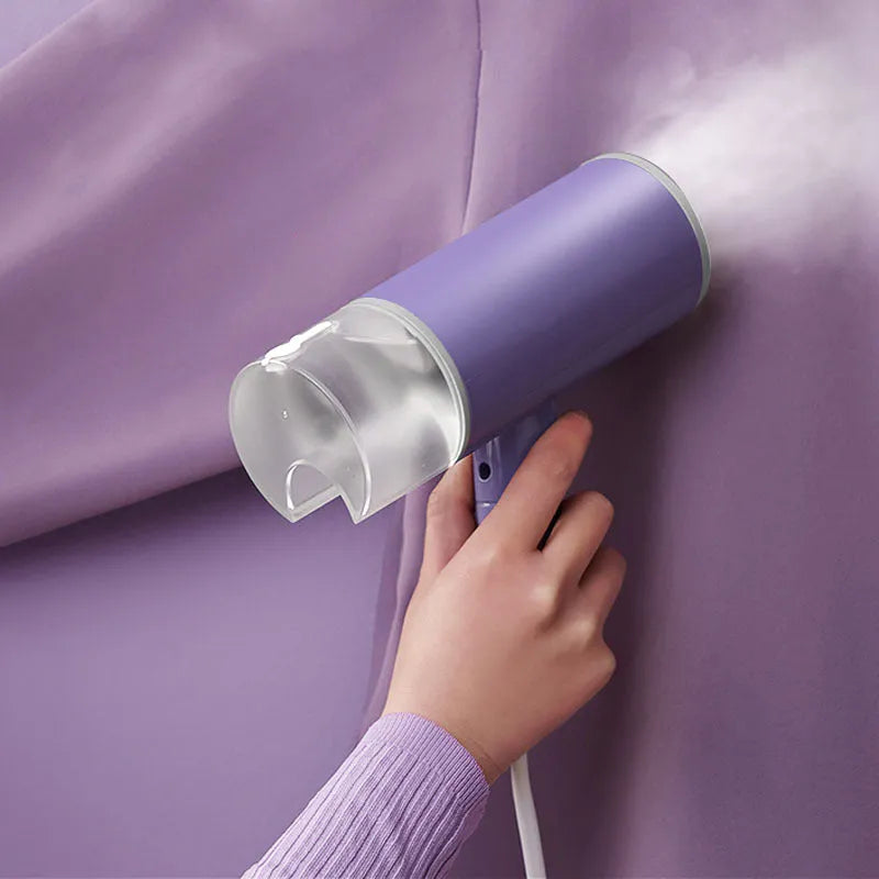 Portable handheld garment steamer in grey lotus root purple colour with foldable design
