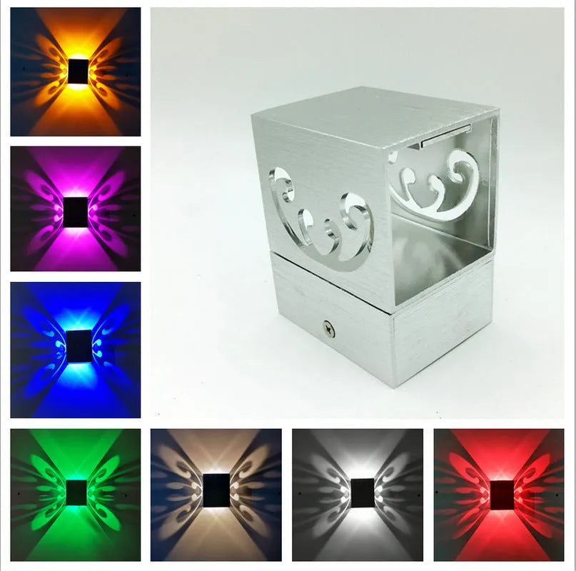 Modern aluminium butterfly-shaped LED wall lamp showing concealed and surface mount options.