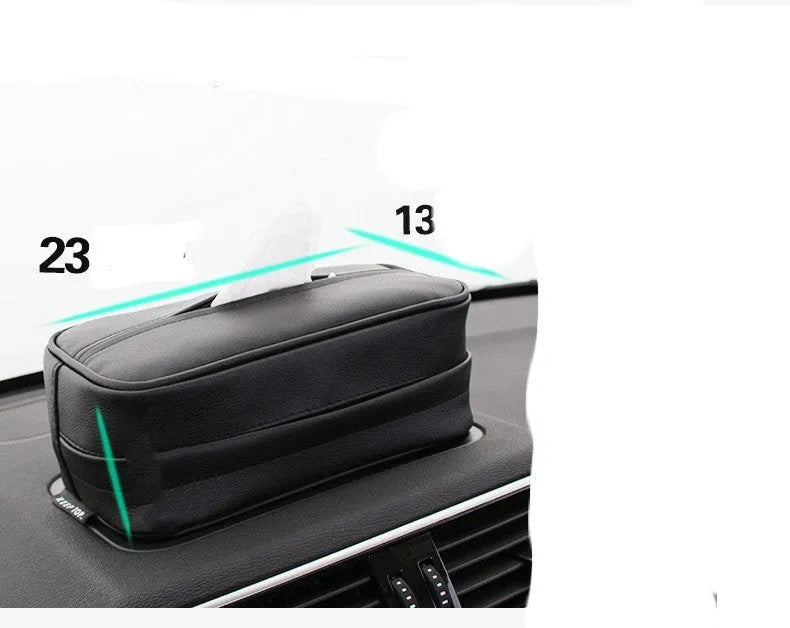 Black PU leather box with hanging loop on a car seat.