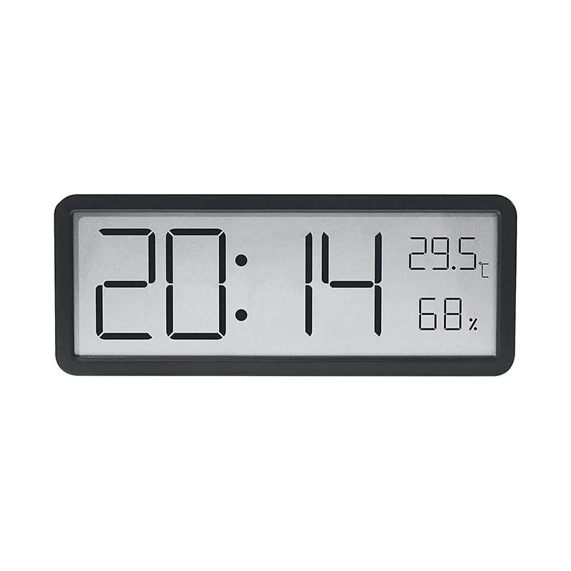 Simple large screen temperature and humidity clock in plastic with Nordic style, black colour, on a desk.