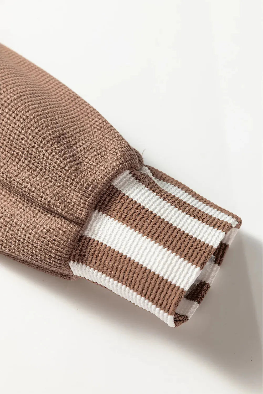 Straw yellow women's hoodie with waffle texture, patchwork stripes, button neck, and drawstring hood.