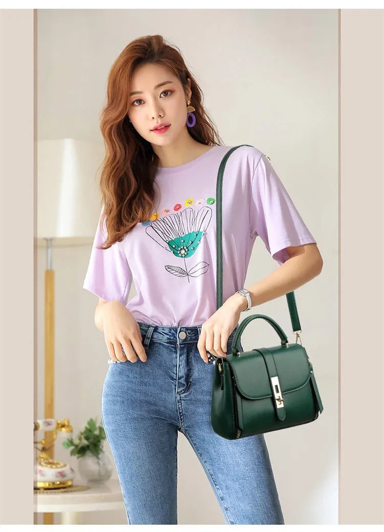 Black soft PU leather women's messenger bag with a single shoulder strap.