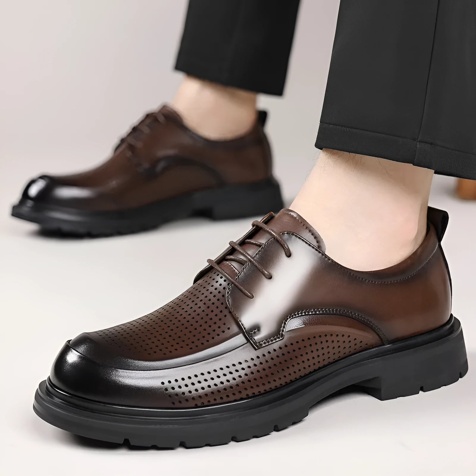 Men's hollow leather low-top business shoes in All Seasons Brown with wedge heel and sewing line detailing