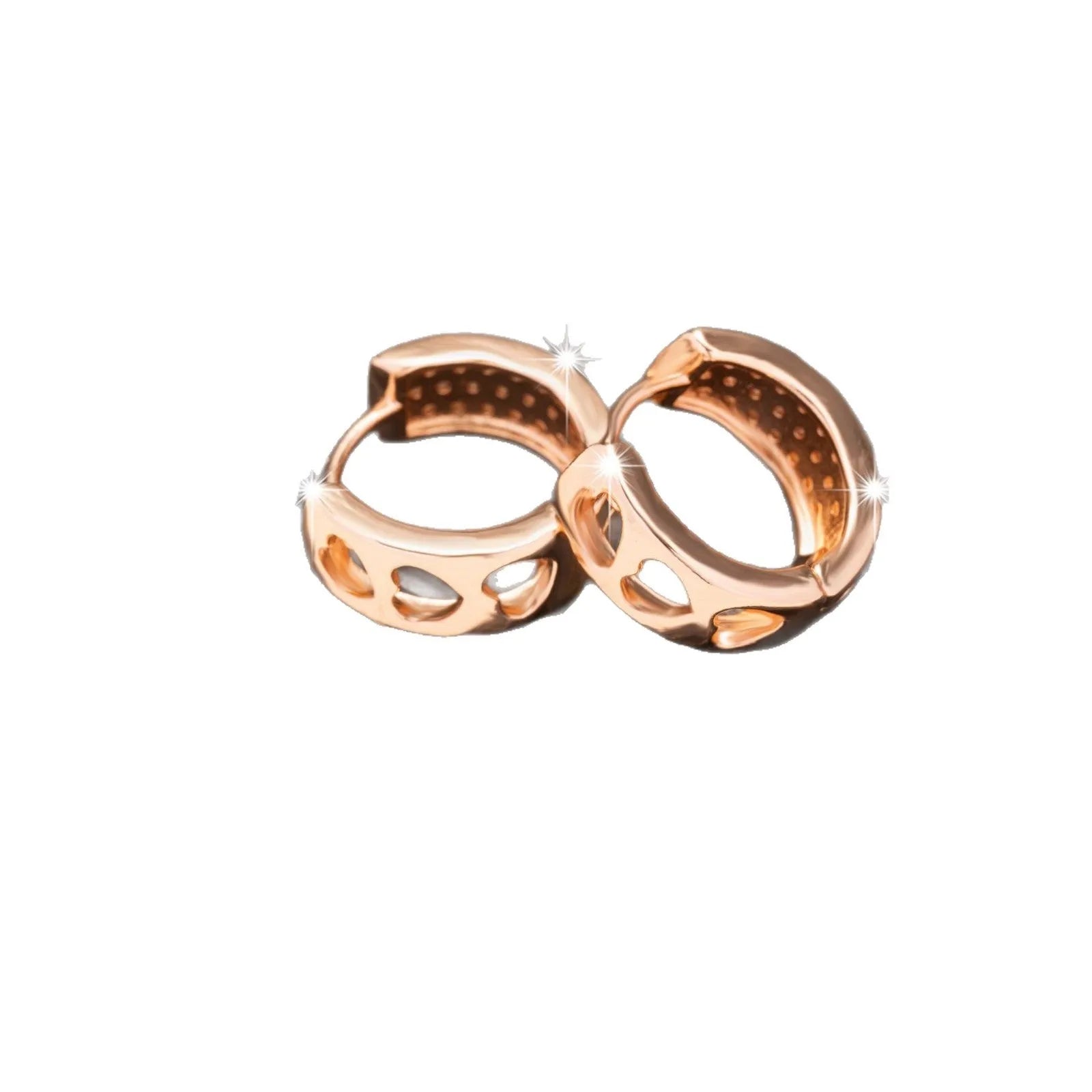 A pair of rose gold hollowed-out heart earrings on a white background, showing three-dimensional openwork detail.