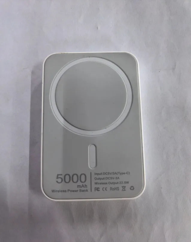 White magnetic wireless charger power bank showing compact dimensions and creative design