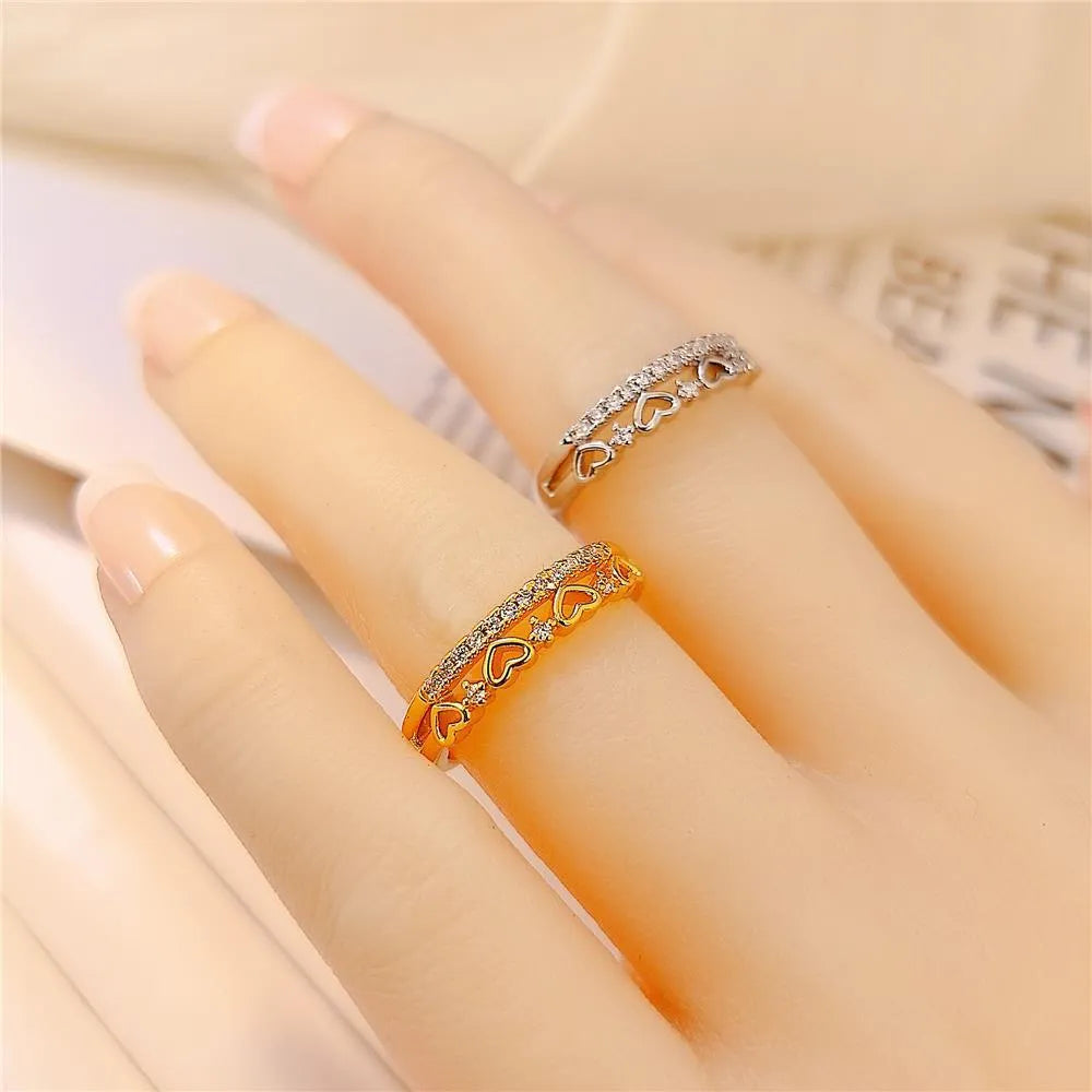 Adjustable open ring in gold or silver with double layer heart, crown and star design on copper band