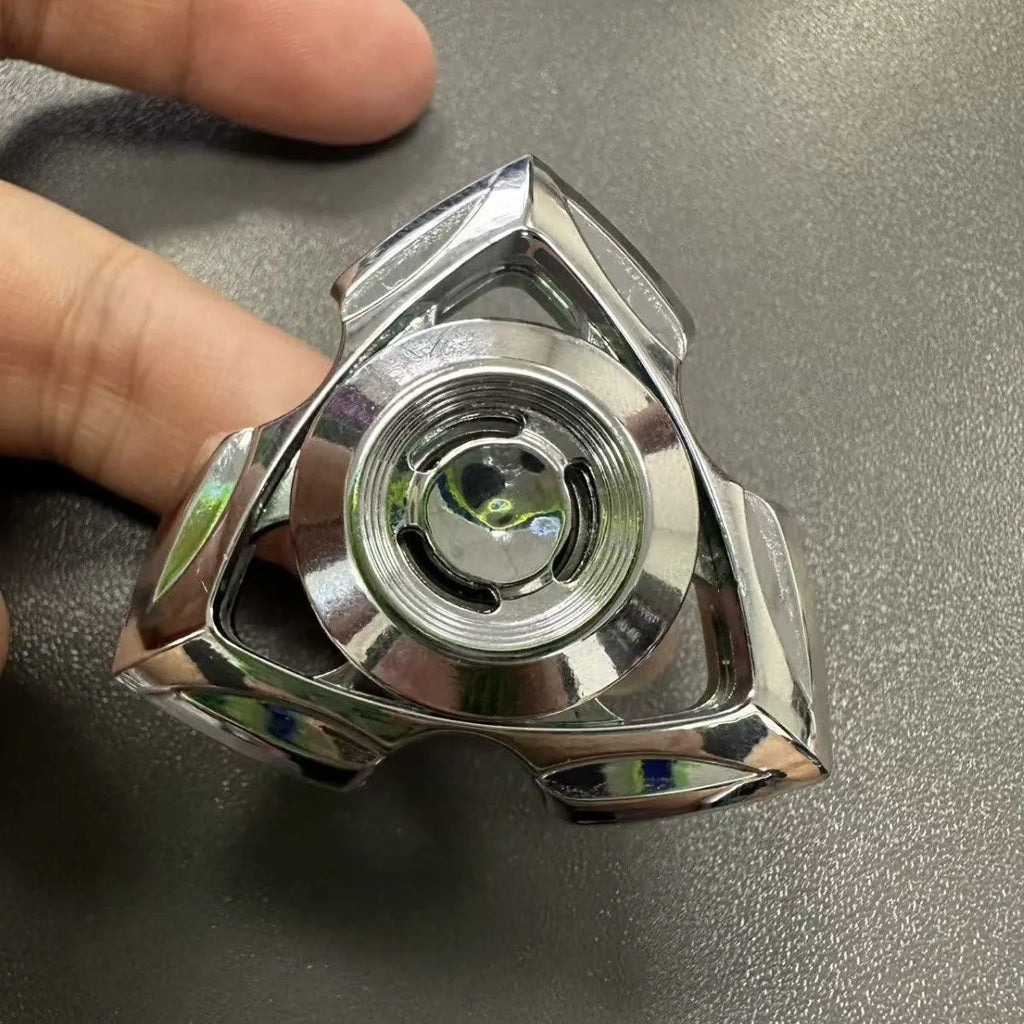A silver and a colourful alloy metal fingertip decompression gyro spinner toy.