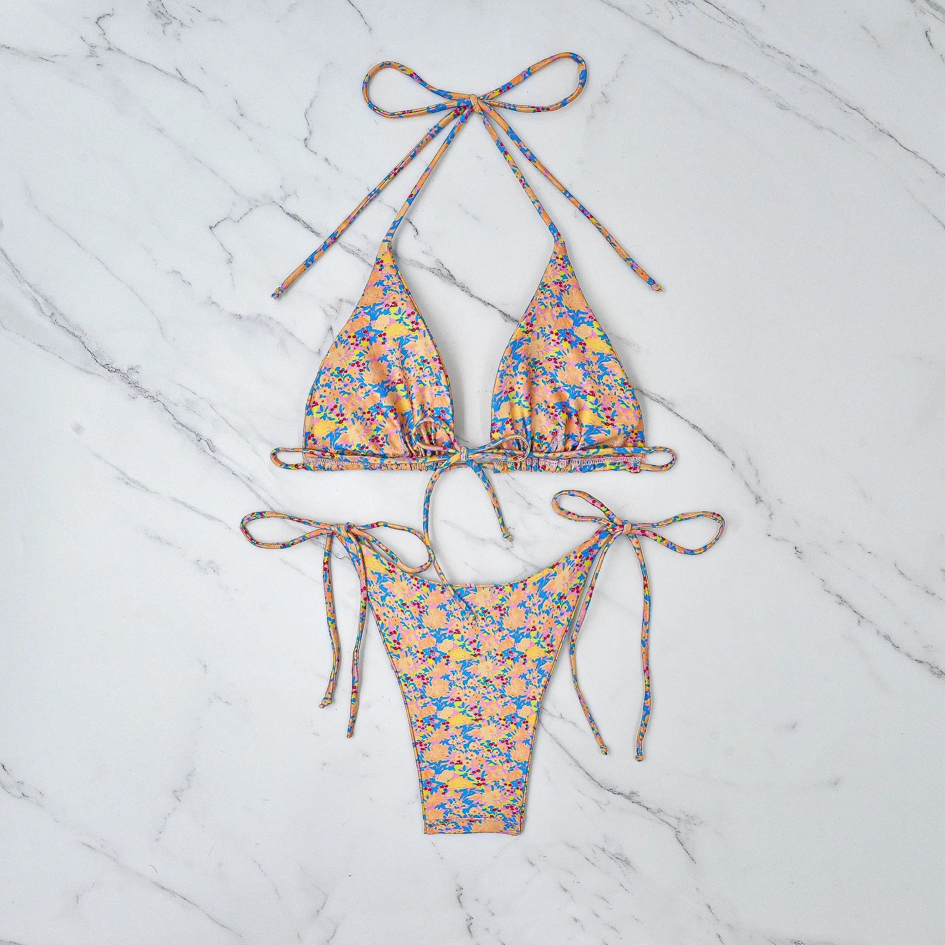 Women's lace-up bikini swimsuit with split briefs in picture colour for swimming activities