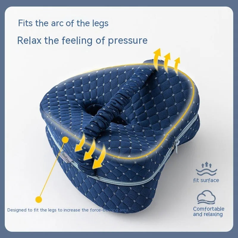 Dark blue jacquard love heart-shaped memory foam leg pillow for knee and hip support.