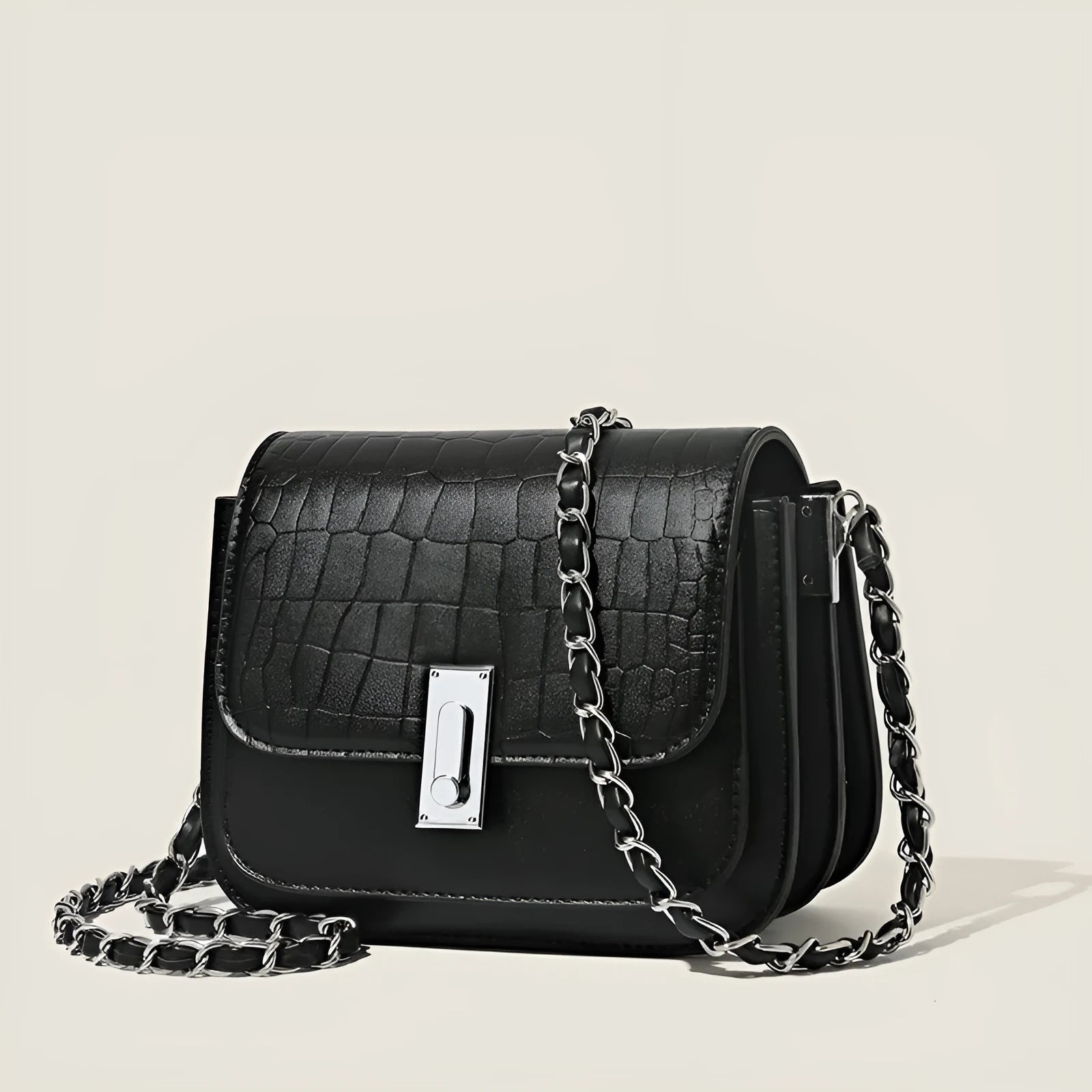 Soft PU leather women's crossbody shoulder bag in black, shown with a phone in the interior pocket.