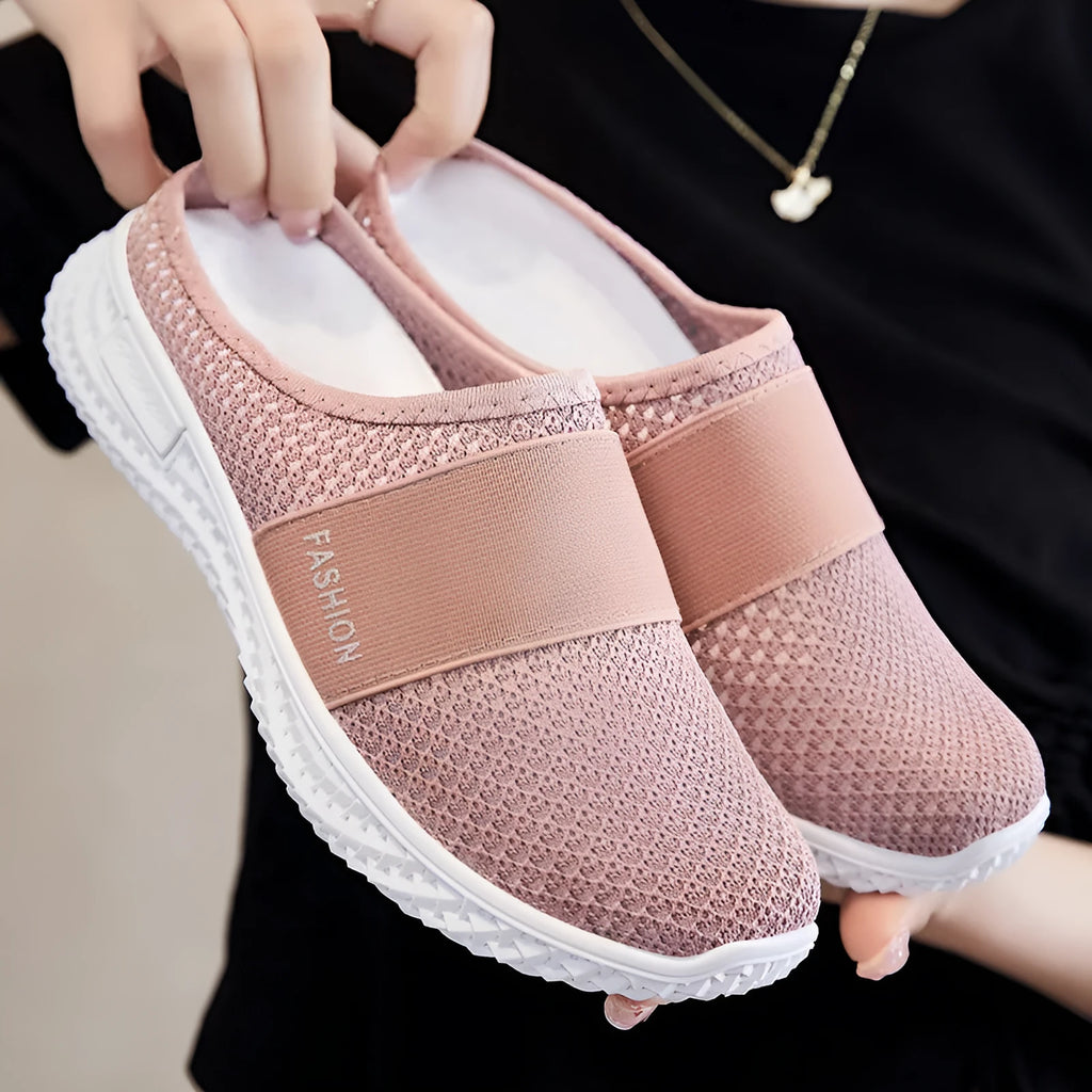 Women's mesh casual shoes with hollow-out design and flat heel in black colour