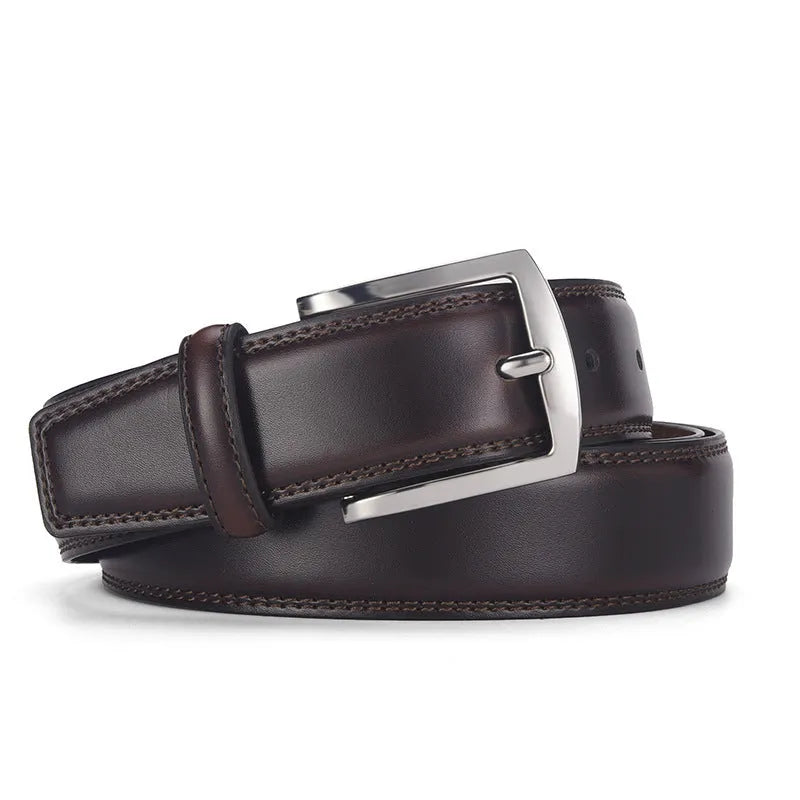 Men's black genuine leather belt with a silver alloy pin buckle shown on a flat surface