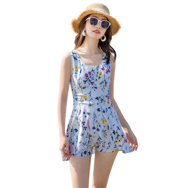 Women's floral print one-piece swimsuit in light purple or white colour