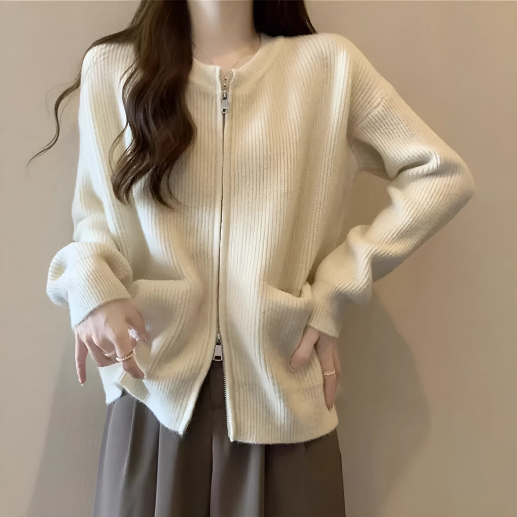 Beige viscose soft sweater coat cardigan with long sleeves on a hanger