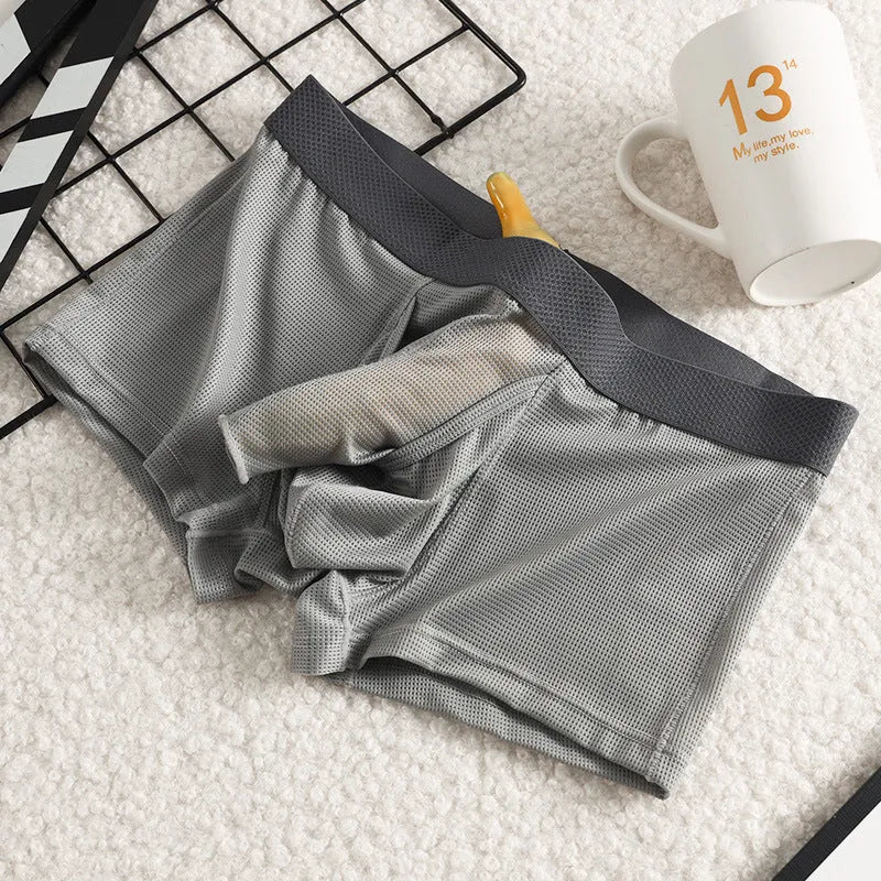 Men's ice silk boxer shorts with mesh fabric in black, white, and grey colour options
