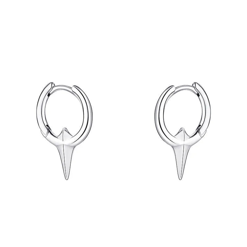 Platinum-coloured star-shaped ear clips with geometric design and clip-on fitting