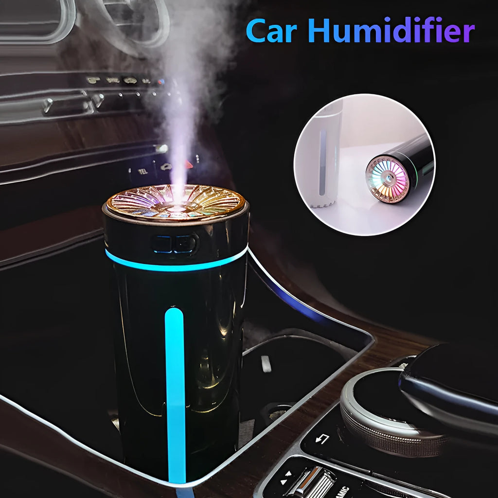 Black portable USB rechargeable humidifier with colourful lights on a car cup holder.