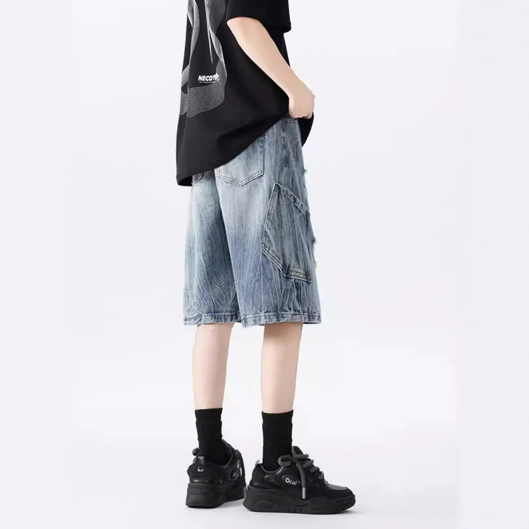 Retro washed denim shorts with loose fit and distressed ripped detailing in black or blue