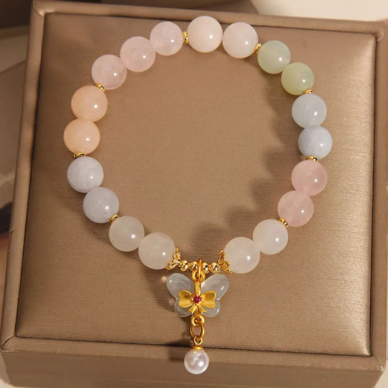 Women's bracelet with colourful Morganite butterfly pendant and crystal links.