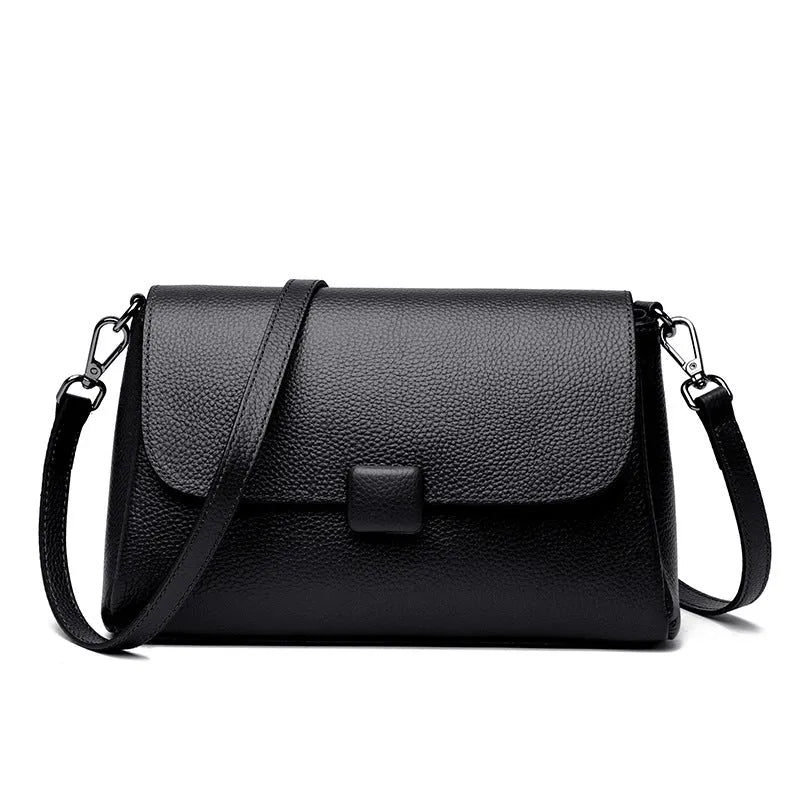 Genuine first-layer cowhide leather shoulder bag in horizontal square shape, 26x16x9cm, black colour, with top zipper and sandwich pocket