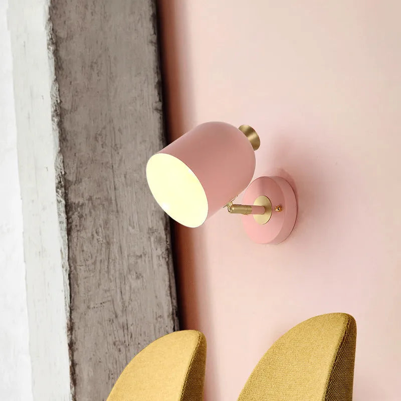 Modern aluminium bedside wall lamp with a mirrored front and a single LED light head.