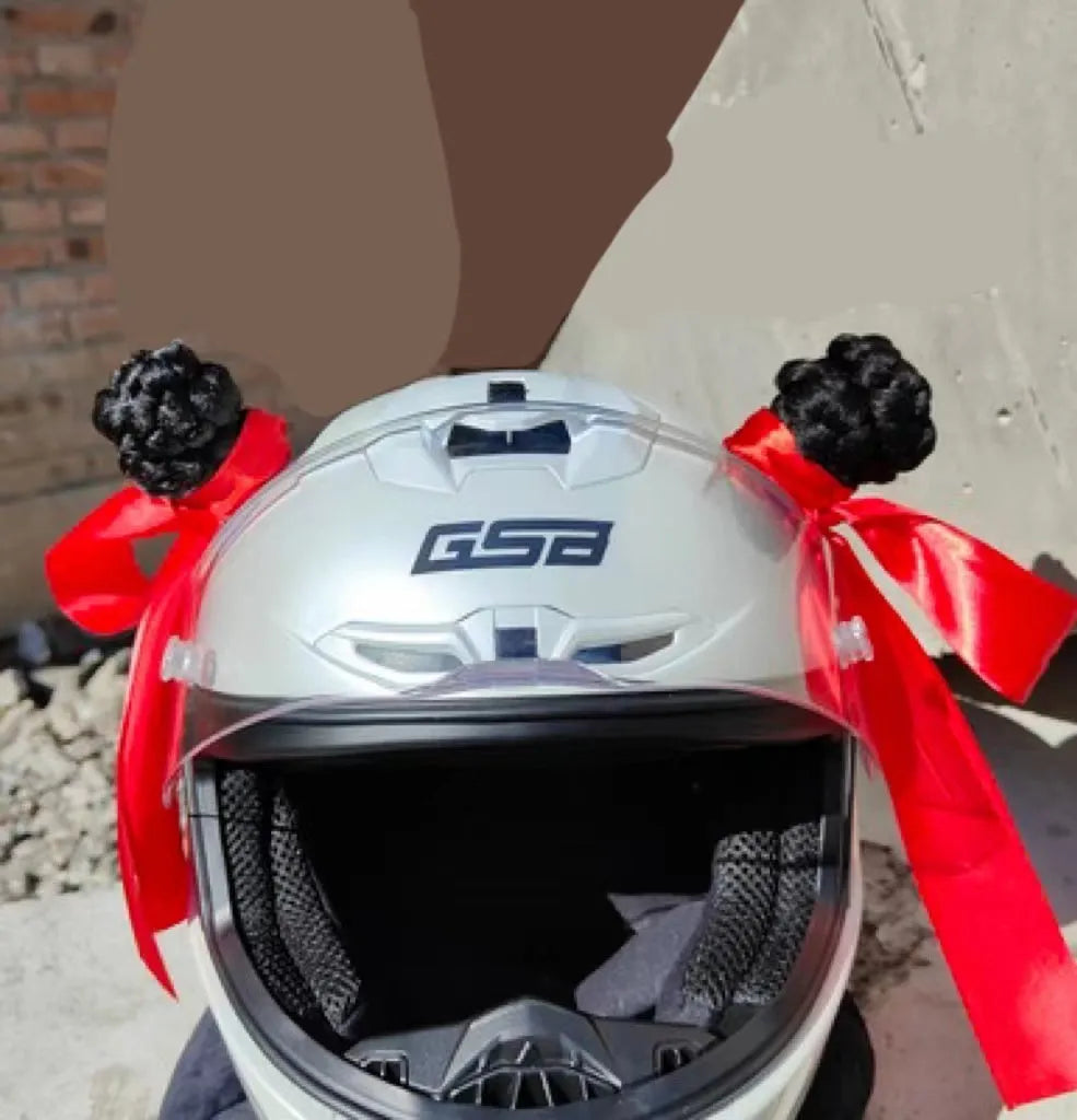 Pair of synthetic braid decorations and adhesive tube for customising motorcycle or ski helmets.