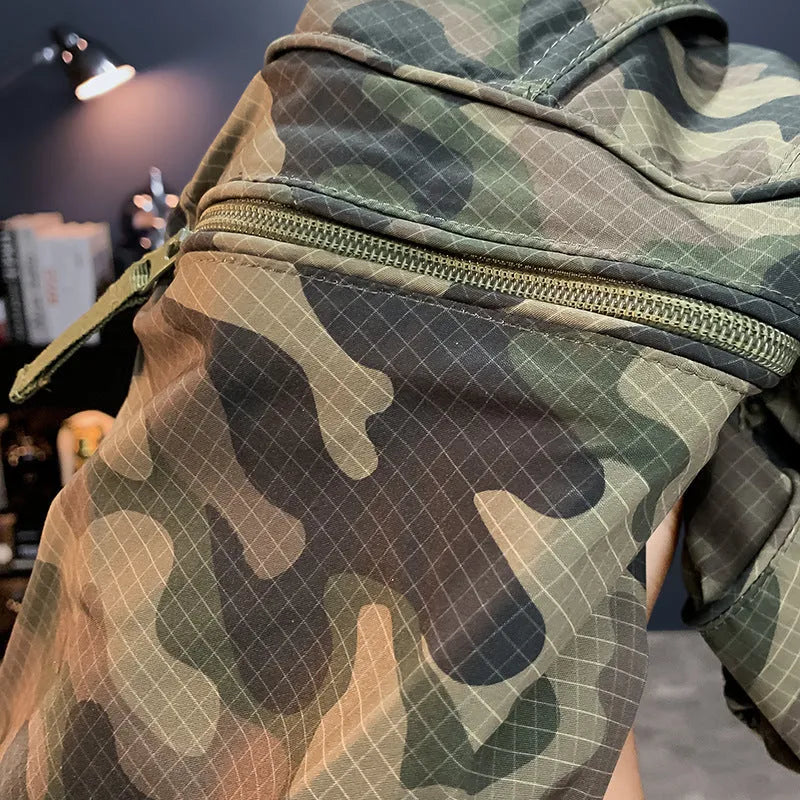 Man wearing olive camouflage cargo shorts with a loose fit and cargo pockets.