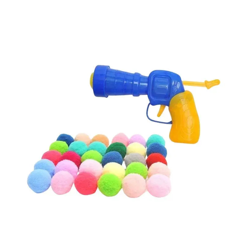Pet toy set showing foam launch gun and assortment of soft plush balls for interactive fetch games