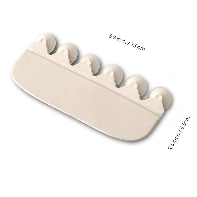 White PVC urine blocking splash guard for toilet training, shown on a toilet seat.