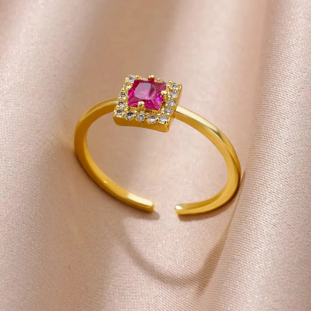 18K gold plated copper open mouth ring with synthetic zircon love emerald motif on white background