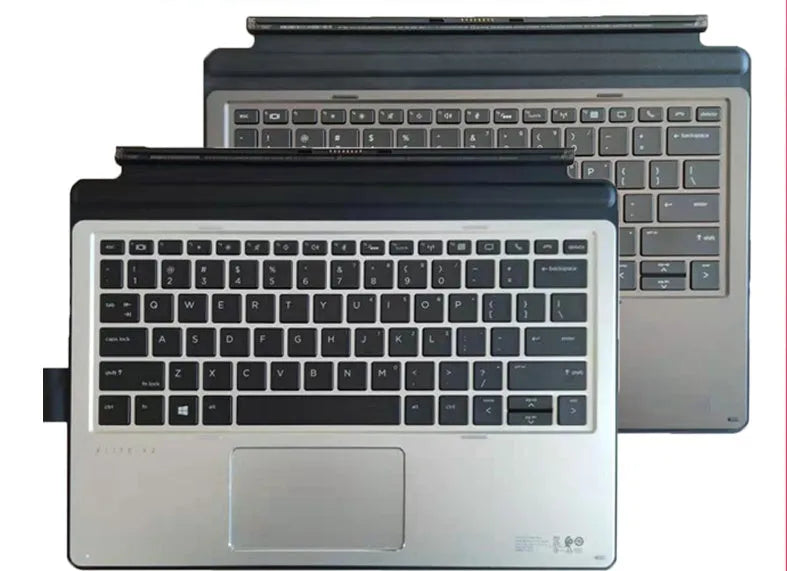 Slim wireless keyboard attached to an Elite X2 tablet, showing ergonomic tilt and multimedia function keys.