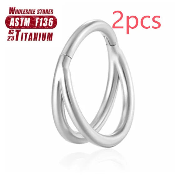 Titanium alloy fork nose ring in silver colour on a grey background