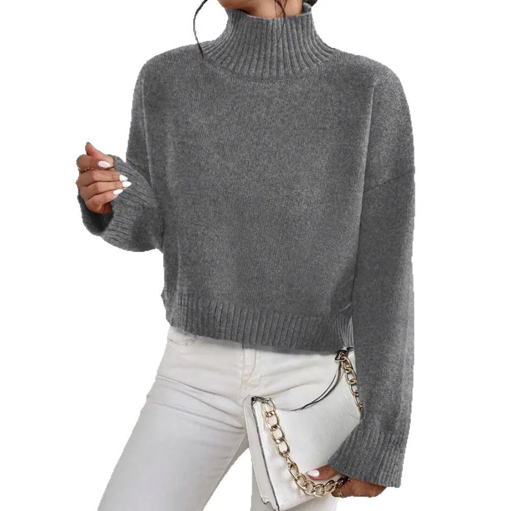 Loose versatile basic women's pullover in gray, showing thread texture and relaxed fit